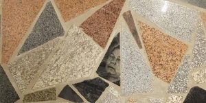 Gravestone Portraits Become Fragments Of The Floor In A Shopping Center