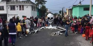 Giant Skeletons Emerge From A Street In Mexico City