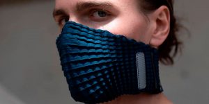Made From Recycled Plastic Bottles, This Expandable, Reusable Face Mask Adjusts To All Face Shapes And Sizes