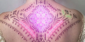 Russian Artist Creates Incredible Animated Tattoos with Neon Lights