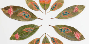 Artist Creates Intricately Patterned Artworks by Delicately Stitching Colourful Threads Into Leaves