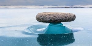 Baikal Zen: Rare Phenomenon Makes Rocks Look Like They Are Floating Above Water