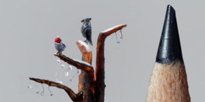Artist Carves Tiny Birds Under A Microscope To Make The Outside World Disappear