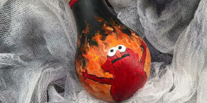 This Artist Paints On Burnt Out Lightbulbs To Repurpose Them As Christmas Tree Ornaments