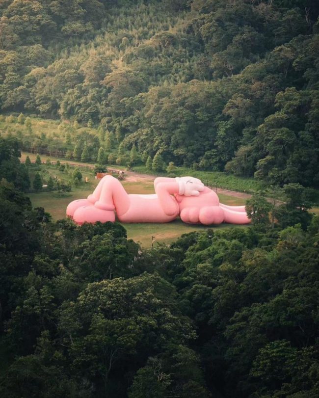KAWS Unveils Colossal 150ft Pink Rabbit Sculpture at Prambanan Temple ...