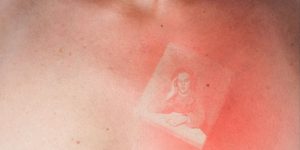 Illustrated People: Photographer Burns Old Photos Onto Human Skin