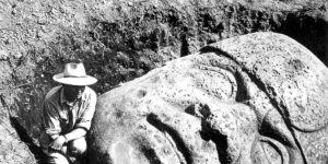 Stunning Vintage Photographs of People Posing With Olmec Colossal Heads in Mexico
