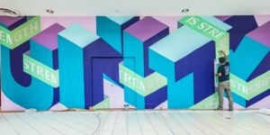 Artist Reshapes Walls And Spaces With Explosive Typographic Murals That Turn Buildings Into Giant, 3D Messages